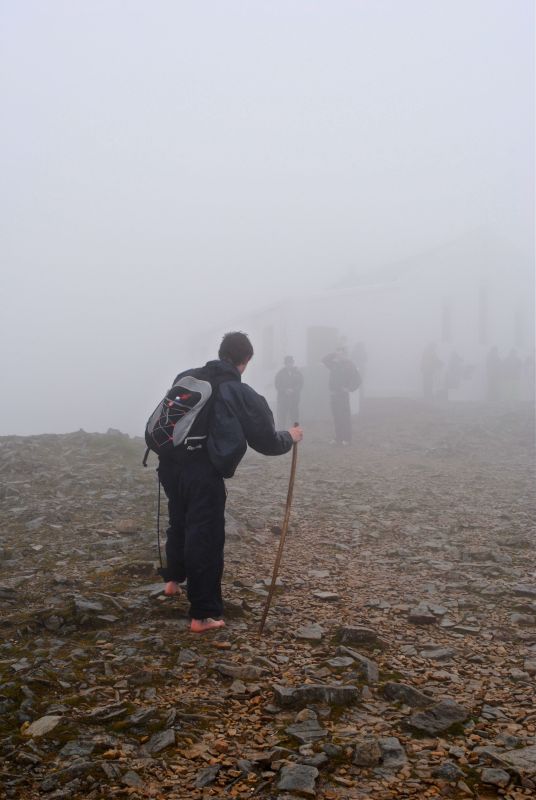 Barefoot pilgrim on summit of Croagh Patrick