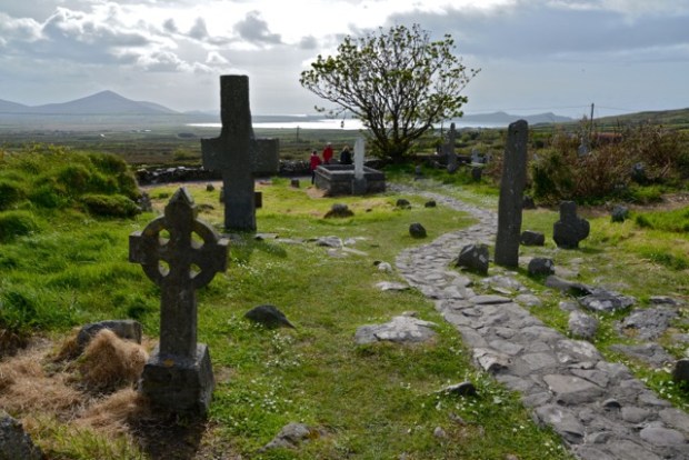 The graveyard of the 12th century Kilmalkedar church on the Cosan na Naomh